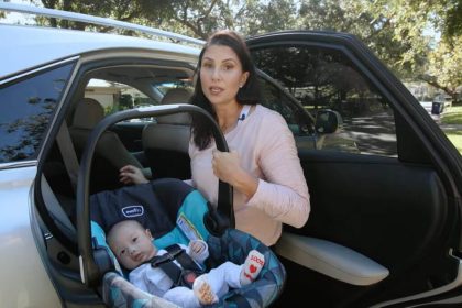 How to burp a baby in a car seat